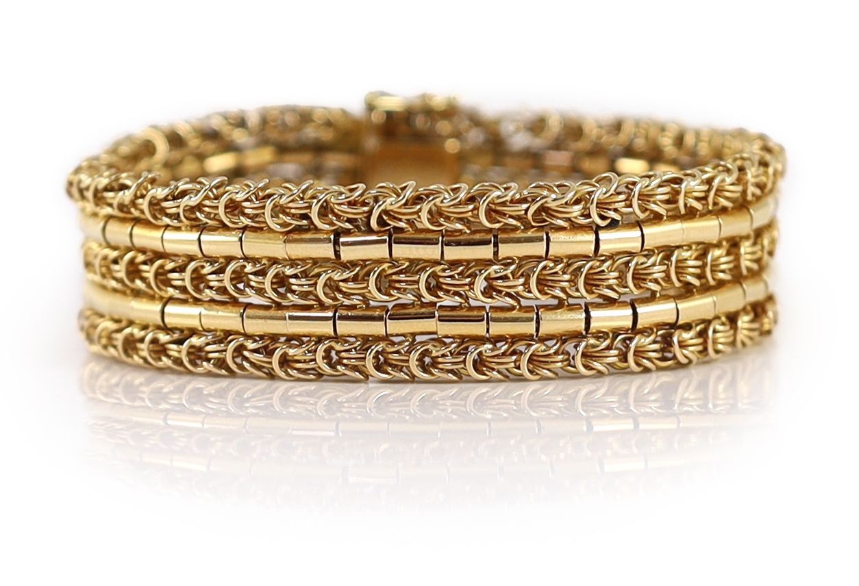 A 20th century 18k gold interwoven three row bracelet